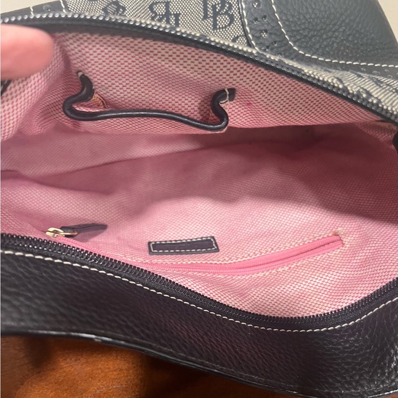 Dooney & Burke black logo printed fabric with black pebbled leather accents. - Picture 9 of 9